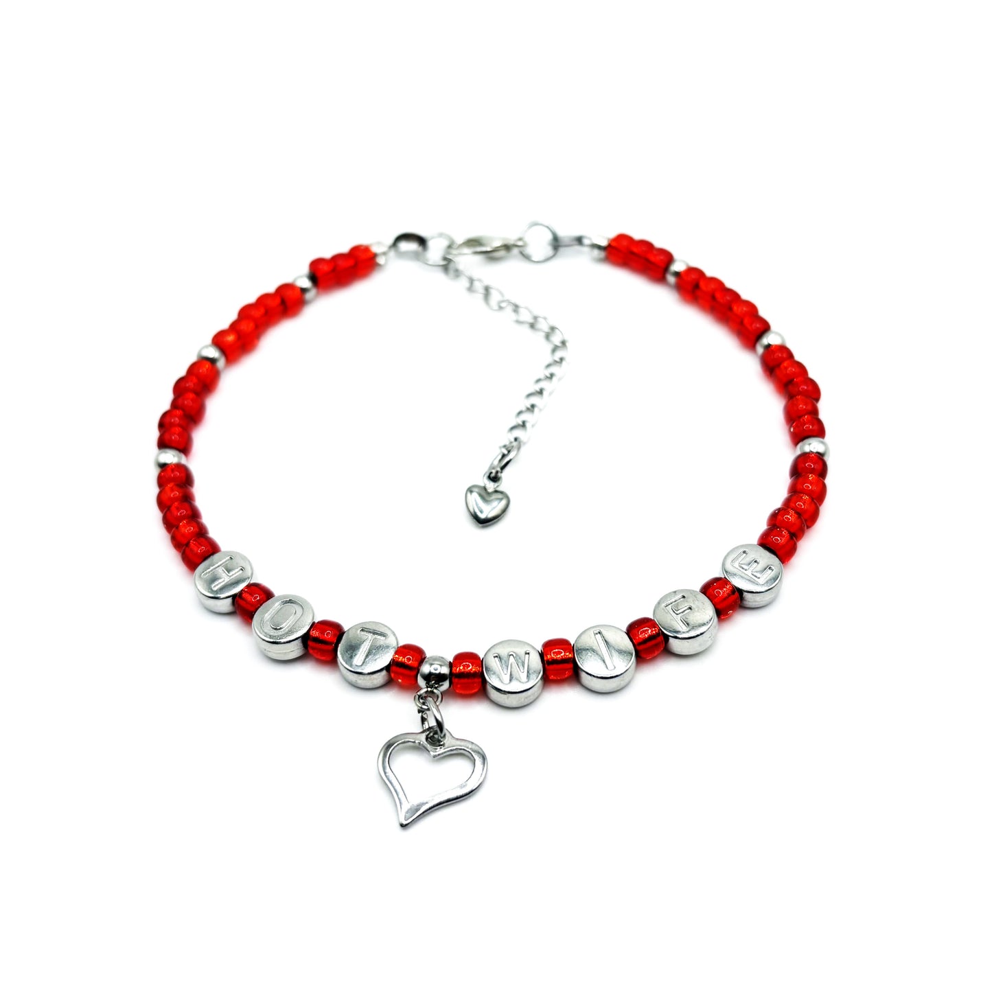 Bracelet with red beads and silver charms on a white background