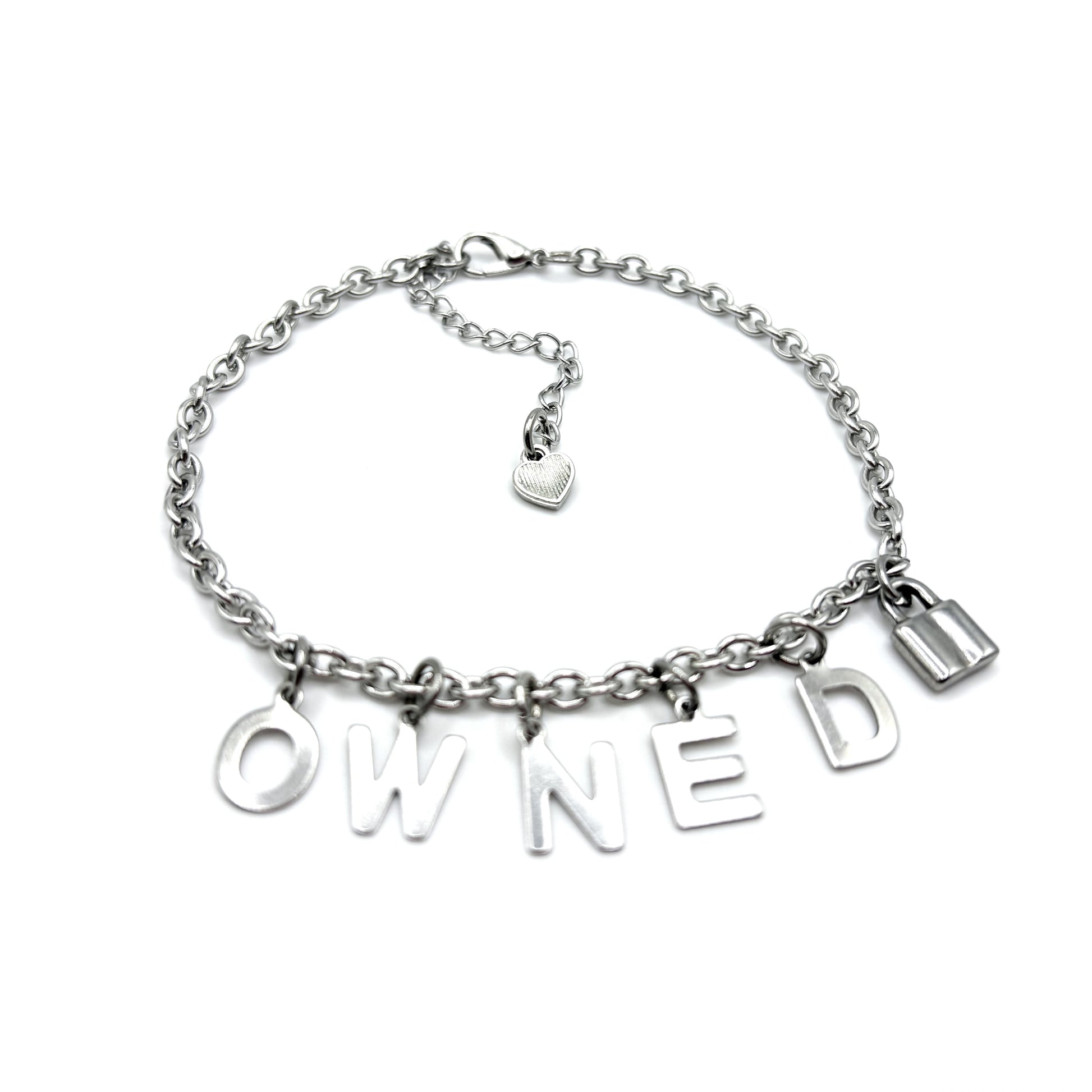 Silver chain bracelet with 'OWNED U' charms on a white background