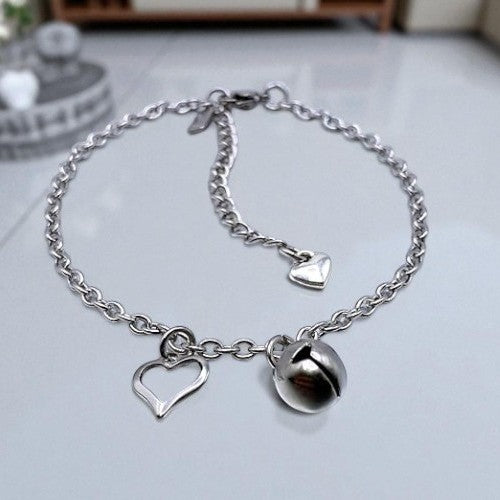 submissinve jingle bell and heart chain anklet