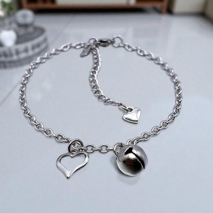 submissinve jingle bell and heart chain anklet
